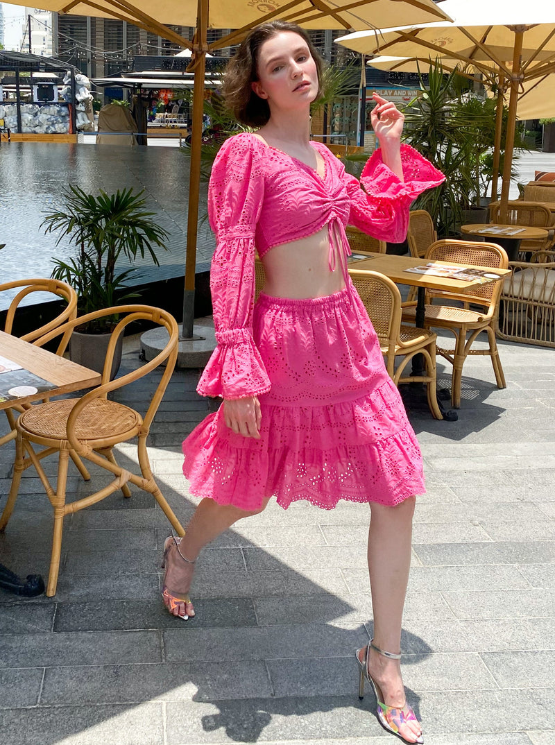 Hot pink crop top and skirt